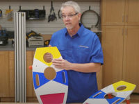 Rob Johnstone shows his custom cornhole game