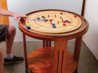 Crokinole game with platform and table