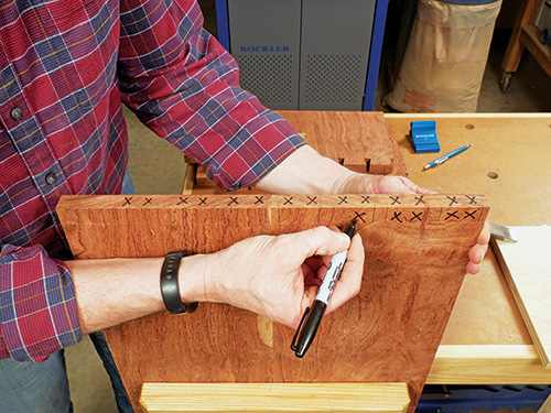Marking waste to cut away from dovetail pins