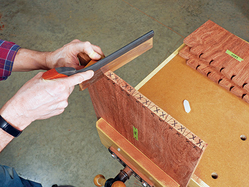 Cutting dovetail pins with hand saw