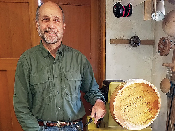 Rick Weil with a turning project mounted on his lathe