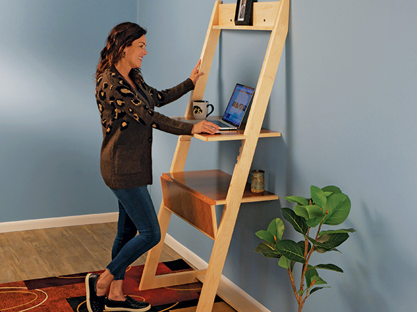 Upper shelf of standing desk project in use