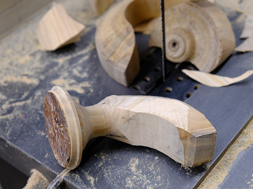 Using band saw to rough cut pumpkin stem shape