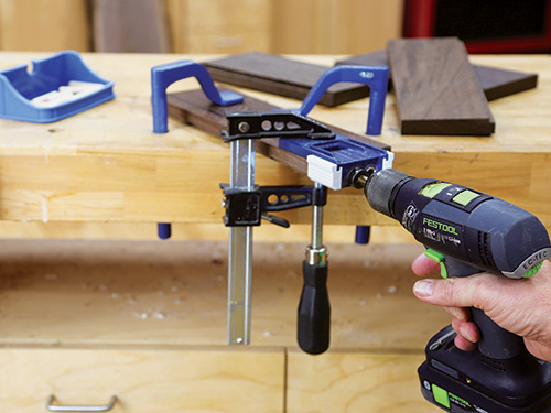 Using doweling jig to cut holes for joinery